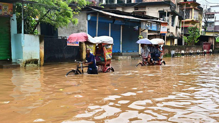 hindistanda sel ve heyelanlar 18 kisinin olumune yol acti HKt2YxL4